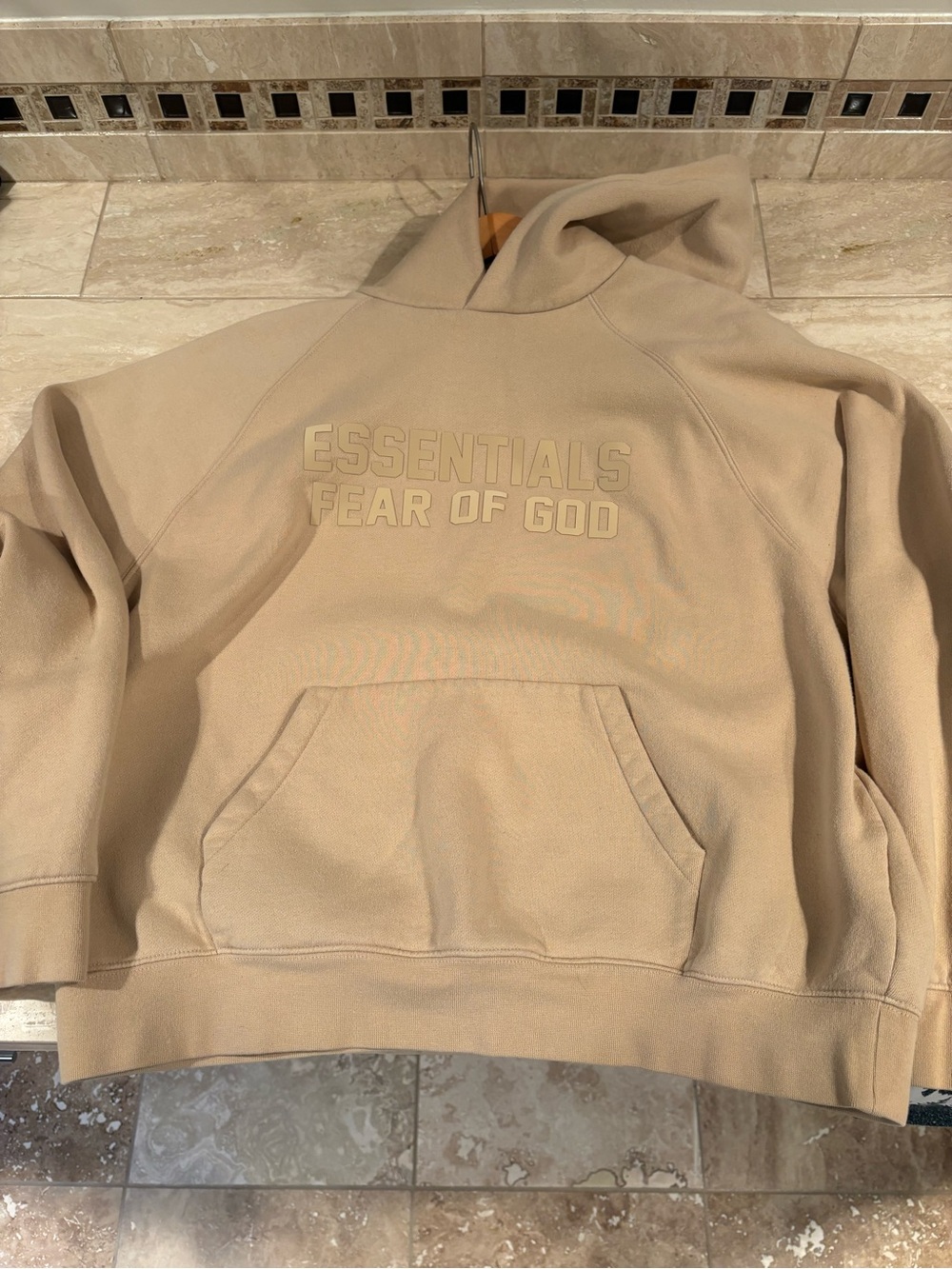 Essentials Cream Pullover Hoodie with Black Logo Patch